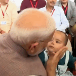 modi with kid HP